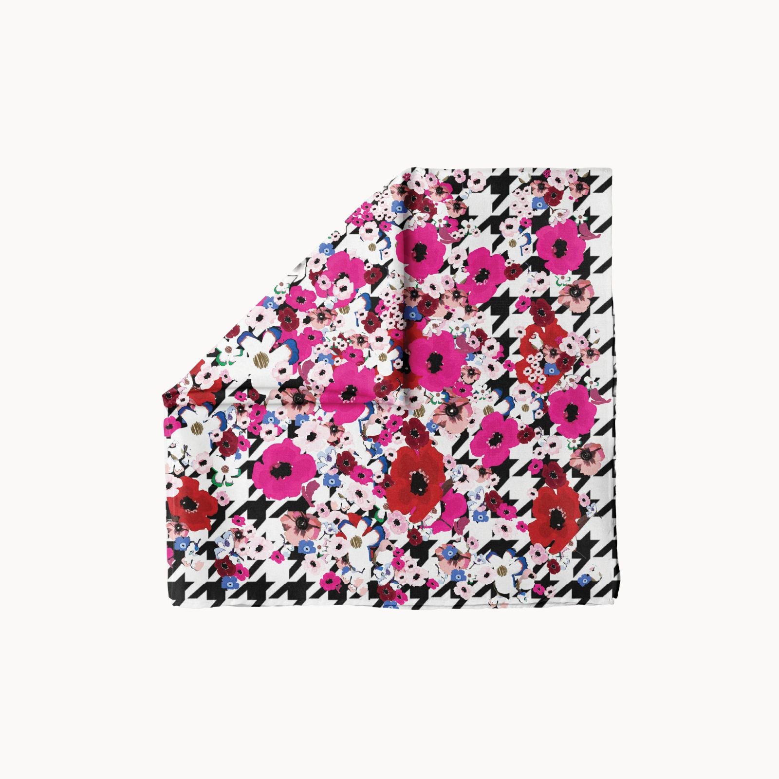 Camellia Cascade headscarf with bold pink, red, and white floral print on black-and-white houndstooth background, statement women's accessory for weddings and special occasions