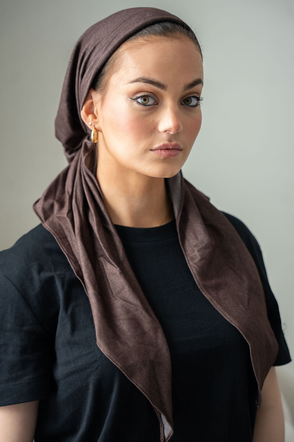 Wrap yourself in earthy elegance with the Mocha Faux Fade Denim Head Scarf. 