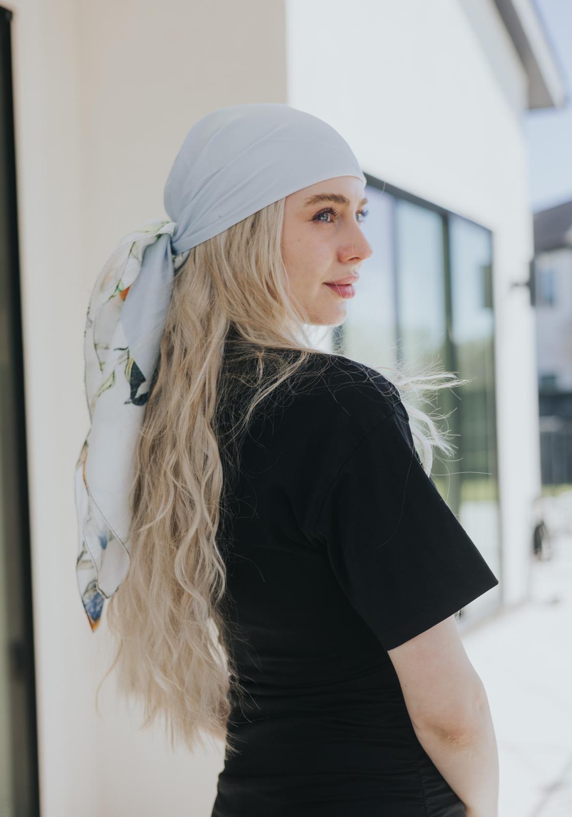 The luxurious, lightweight fabric drapes beautifully and offers versatile styling—from vintage-inspired wraps to effortless drapes. 