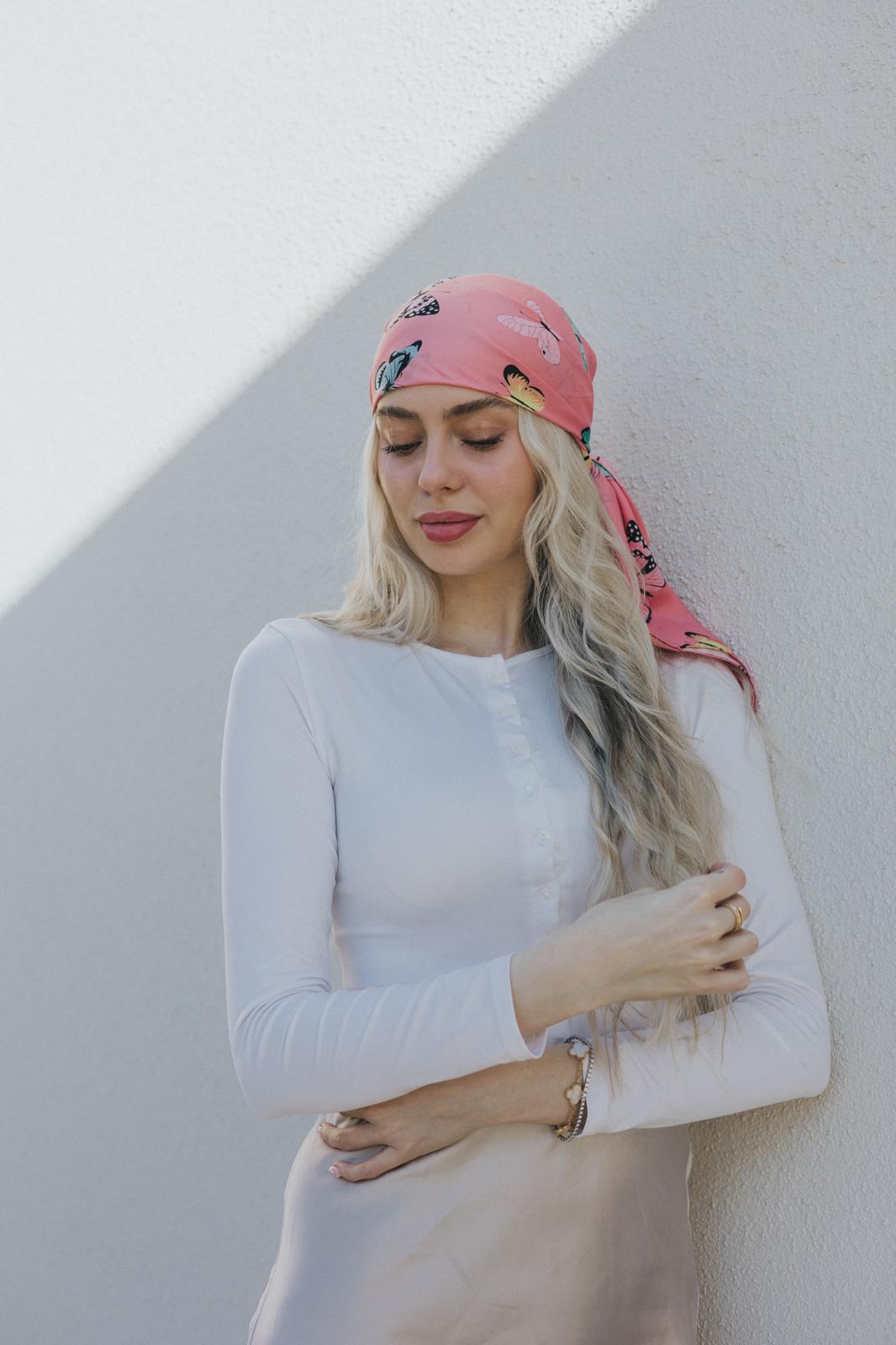 Crafted from soft, flowing silk, it offers a lightweight drape that’s ideal for head wraps, neck ties, or handbag accents.