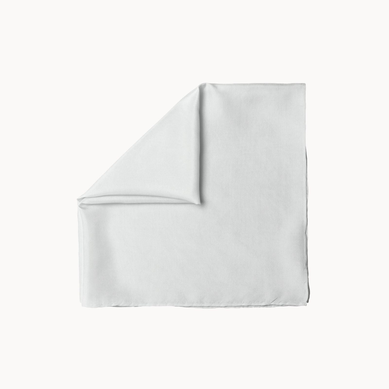 Folded square silk headscarf in a crisp salt breeze white hue, featuring a clean, smooth finish with a subtle sheen, neatly placed on a white background.